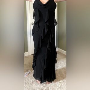 Beautiful black bias cut maxi dress. Can be worn formally or casually.